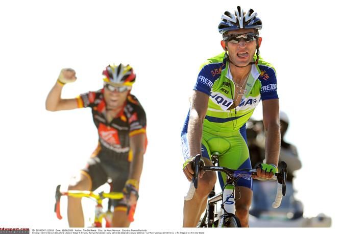 Alejandro Valverde celebrates behind stage winner Sylvester Szmyd