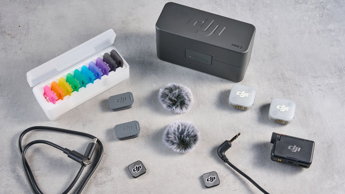 the dji mic mini 2 for camera and smartphone conent creators photographed against the blue tom's guide background