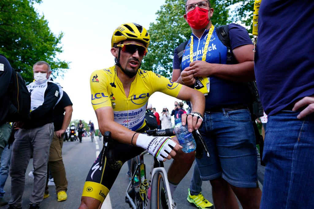 Julian Alaphilippe wearing the Tour de France leader&#039;s jersey in 2021