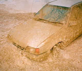 Kent Andreasen photo of car in flood and mud
