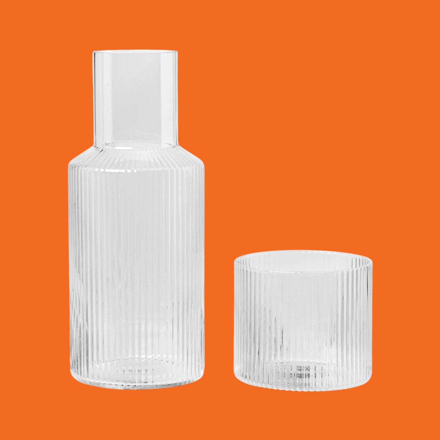 A ribbed carafe and cup