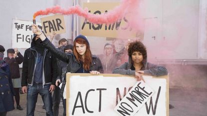 Social group, Interaction, Protest, Youth, Jacket, Banner, Handwriting, Rebellion, Advertising, Social work, 