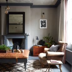 Grey and blue living room with leather furniture