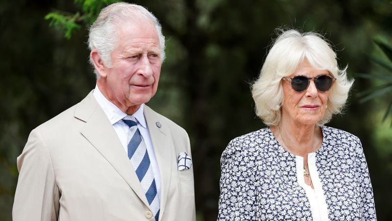 Prince Charles and Duchess Camilla pay their respects during a visit to the Kigali Memorial 