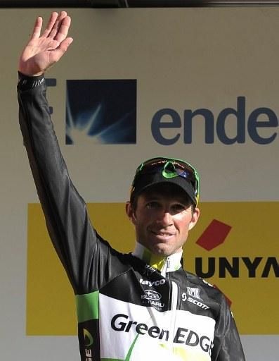 Stage 1 winner Michael Albasini (GreenEdge) on the podium