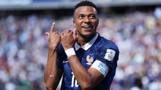 Kylian Mbappe #10 of France celebrates scoring his team's first goal during the FIFA World Cup 2026 Group I match between France and Senegal at New York New Jersey Stadium on June 16, 2026