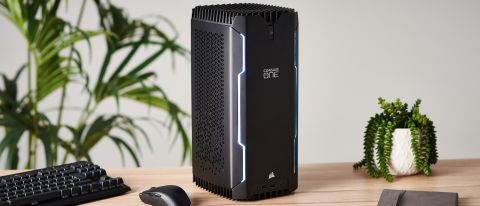 Corsair One i300 gaming PC on wooden desk