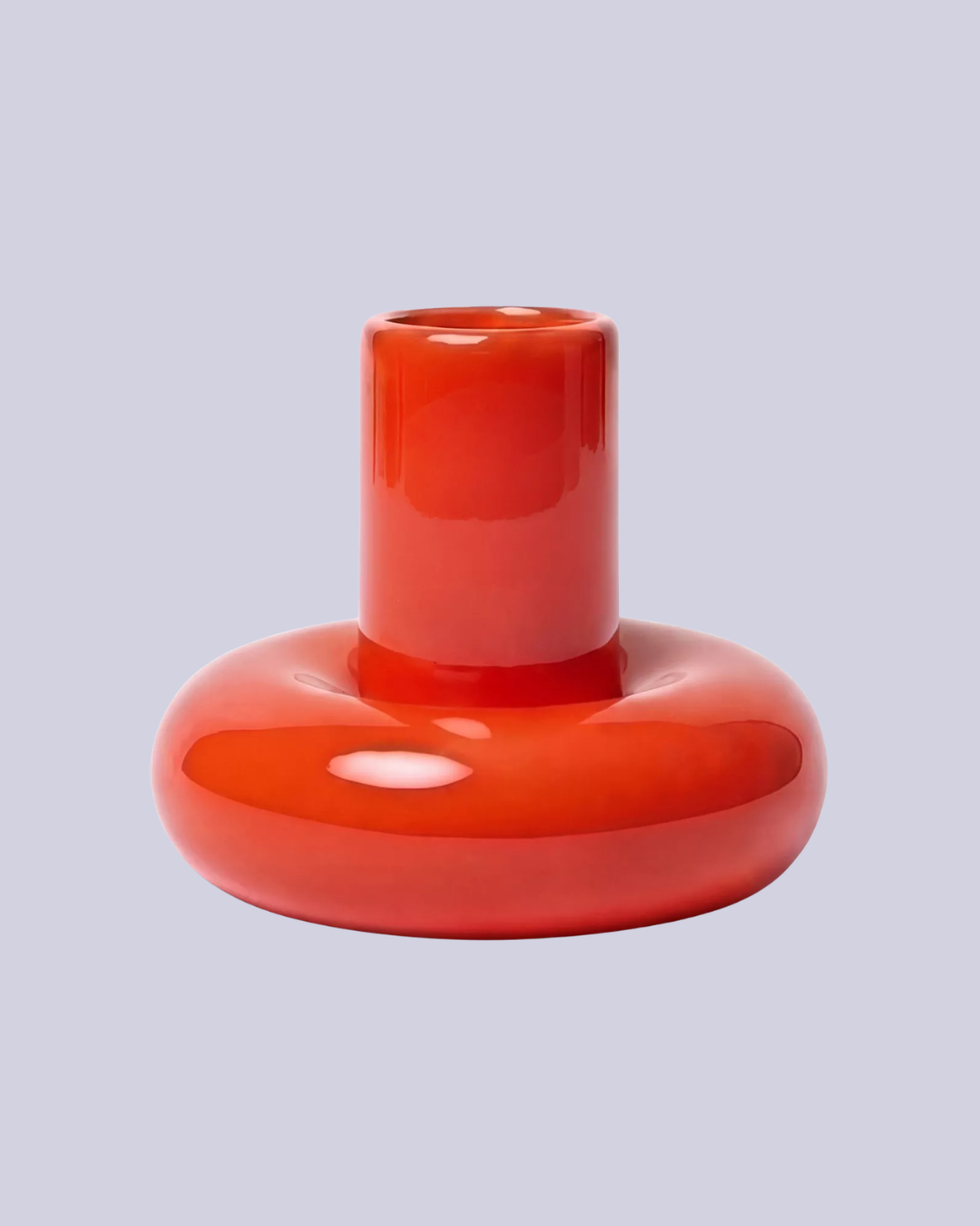 Chunky Earthenware Candle Holder in Bright Red against pale lilac background.