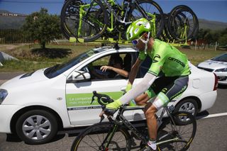 A bandaged up Phil Gaimon at the Cannondale car