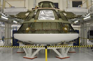 Ground test version of the Orion multi-purpose crew vehicle (MPCV) inside the Operations and Checkout (O&C) building at NASA’s Kennedy Space Center in Florida. The capsule is being used to ready the facility for the arrival of the first MPCV that will fly into space.