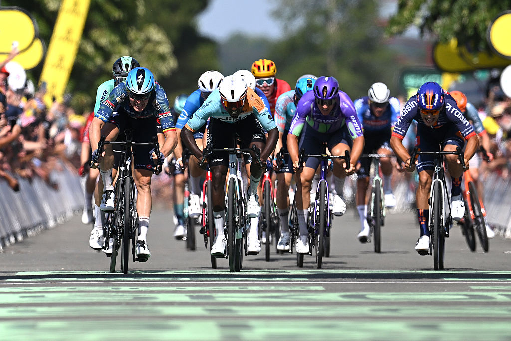 Tim Merlier of Belgium and Biniam Girmay sprint to the finish line during the 113th Tour de France 2026, Stage 8