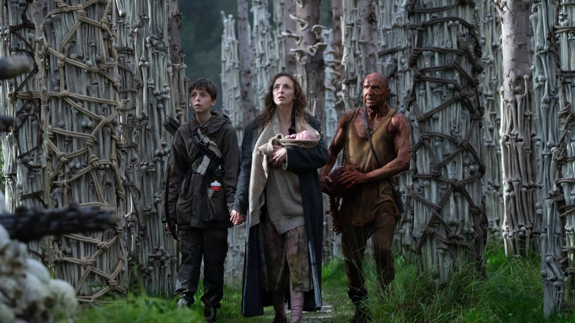 Dr. Kelson welcoming Spike and Isla to the Bone Temple in Danny Boyle's zombie horror sequel 28 Years Later