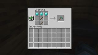 Minecraft diamonds - a diamond pickaxe being crafted