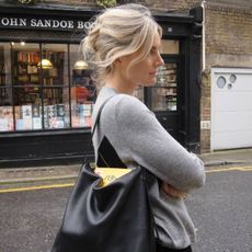 Lucy wearing apc bag