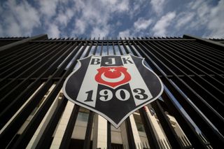 The Besiktas badge on a fence outside the club's stadium