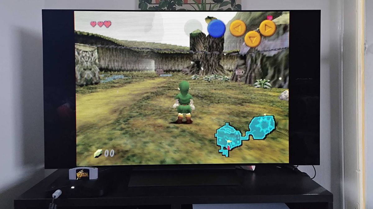 Analogue 3D connected to LG OLED C4 TV with Zelda: Ocarina of time gameplay on screen.