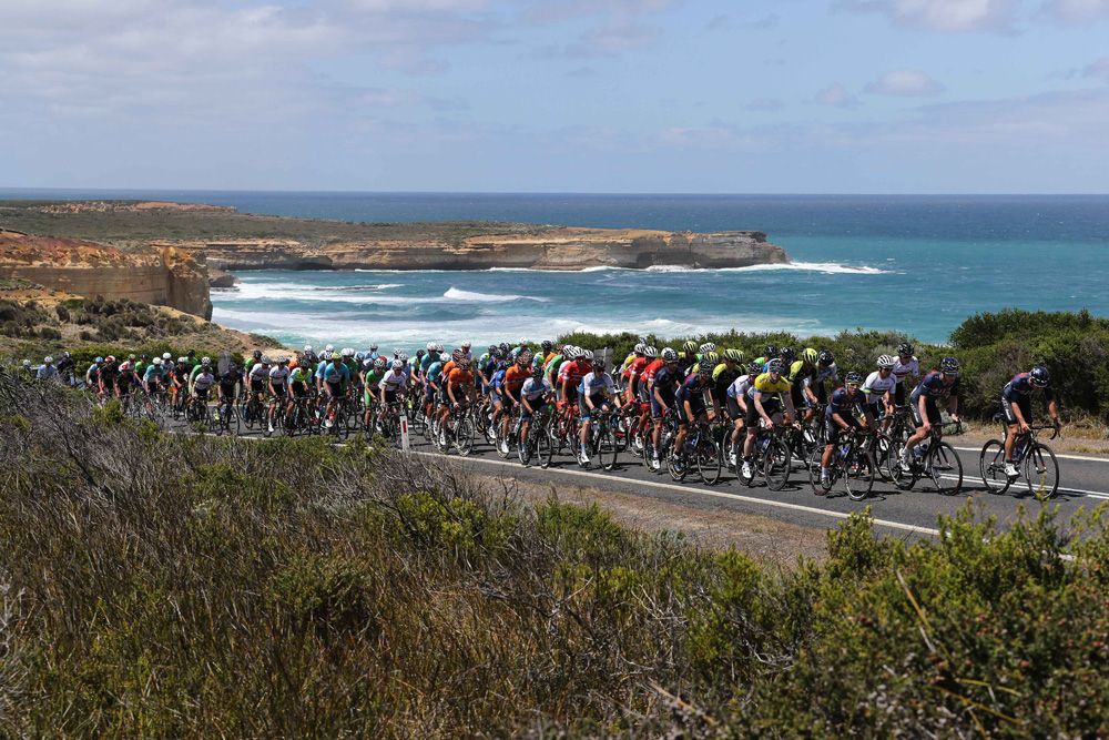 The peloton pass along the stunning Great Ocean Road