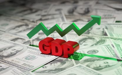 GDP sign and green upwards arrow sits on top of American dollars
