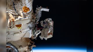 Cosmonauts (from left) Denis Matveev and Oleg Artemyev worked outside the International Space Station's Russian segment for 6 hours and 37 minutes outfitting Nauka and configuring the European robotic arm in April 2022.
