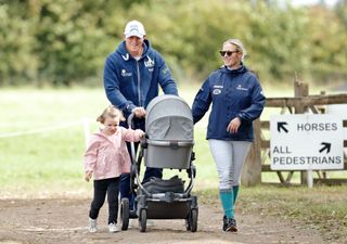 Mike Tindall and Zara Tindall with their daughters Mia Tindall and Lena Tindall (in her pram) attend day 3 of the Whatley Manor Horse Trials
