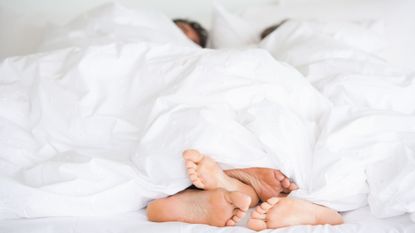 White, Skin, Beauty, Leg, Child, Sleep, Bed sheet, Hand, Linens, Barefoot, 