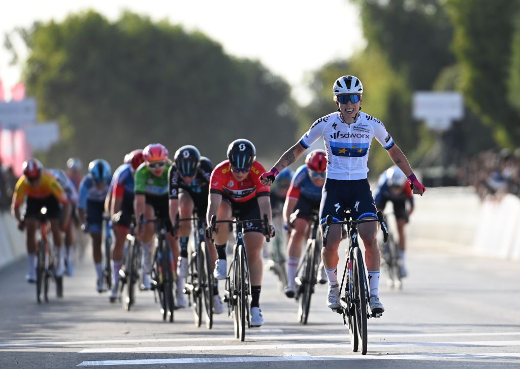 AL MIRFAUNITED ARAB EMIRATES FEBRUARY 10 Lorena Wiebes of The Netherlands and Team SD Worx celebrates at finish line as stage winner ahead of Charlotte Kool of The Netherlands and Team DSM Red Leader Jersey during the 1st UAE Tour Women 2023 Stage 2 a 133km stage from Al Dhafra Castle to Al Mirfa UAETourWomen on February 10 2023 in Al Mirfa United Arab Emirates Photo by Tim de WaeleGetty Images