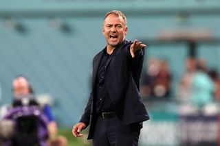 Hansi Flick, Head Coach of Germany reacts during the FIFA World Cup Qatar 2022 Group E match between Germany and Japan at Khalifa International Stadium on November 23, 2022 in Doha, Qatar.