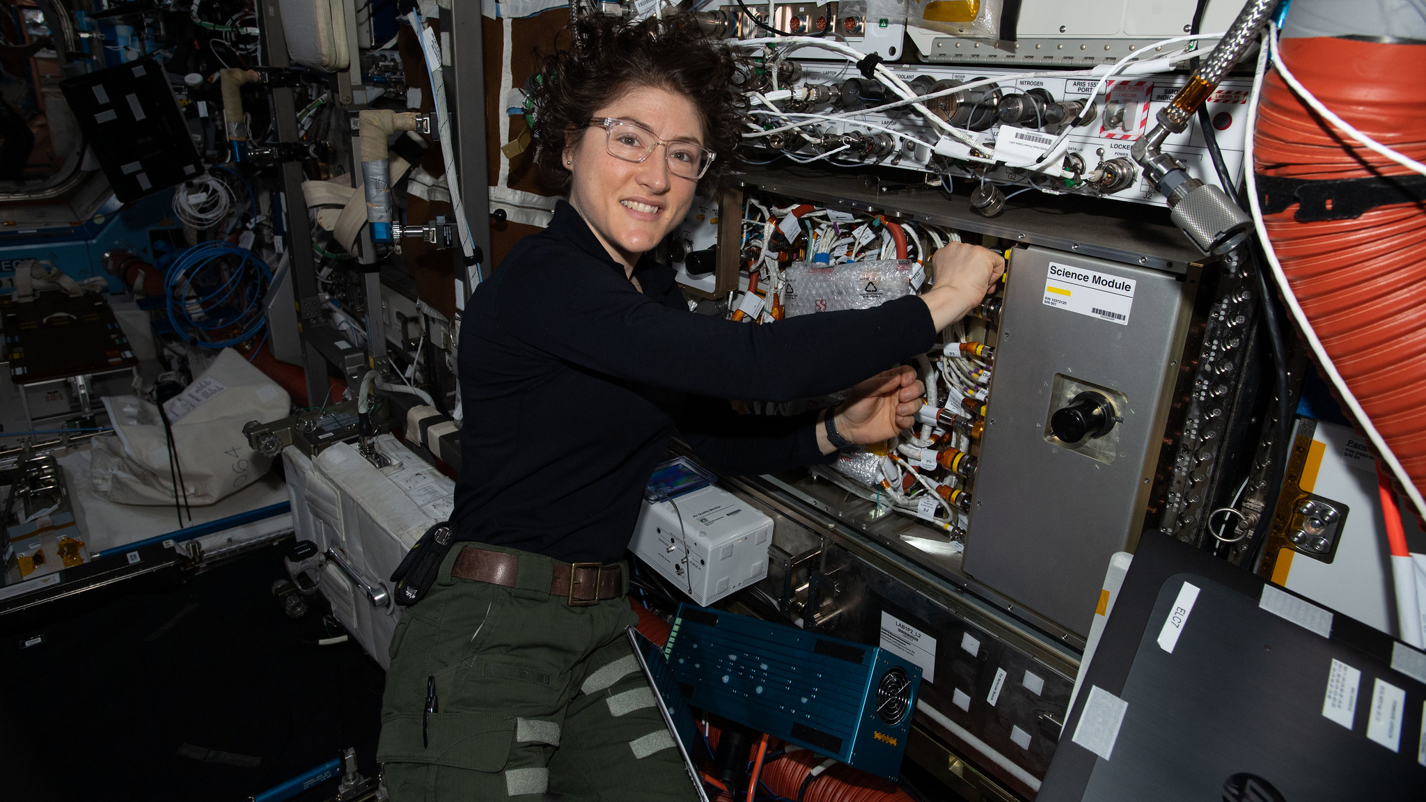 NASA astronaut and Expedition 61 Flight Engineer Christina Koch works on the Cold Atom Lab (CAL) swapping and cleaning hardware inside the quantum research device., on Jan. 28, 2020.