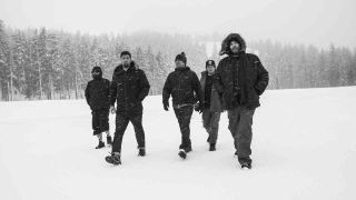 Deftones posing for a photograph in 2016