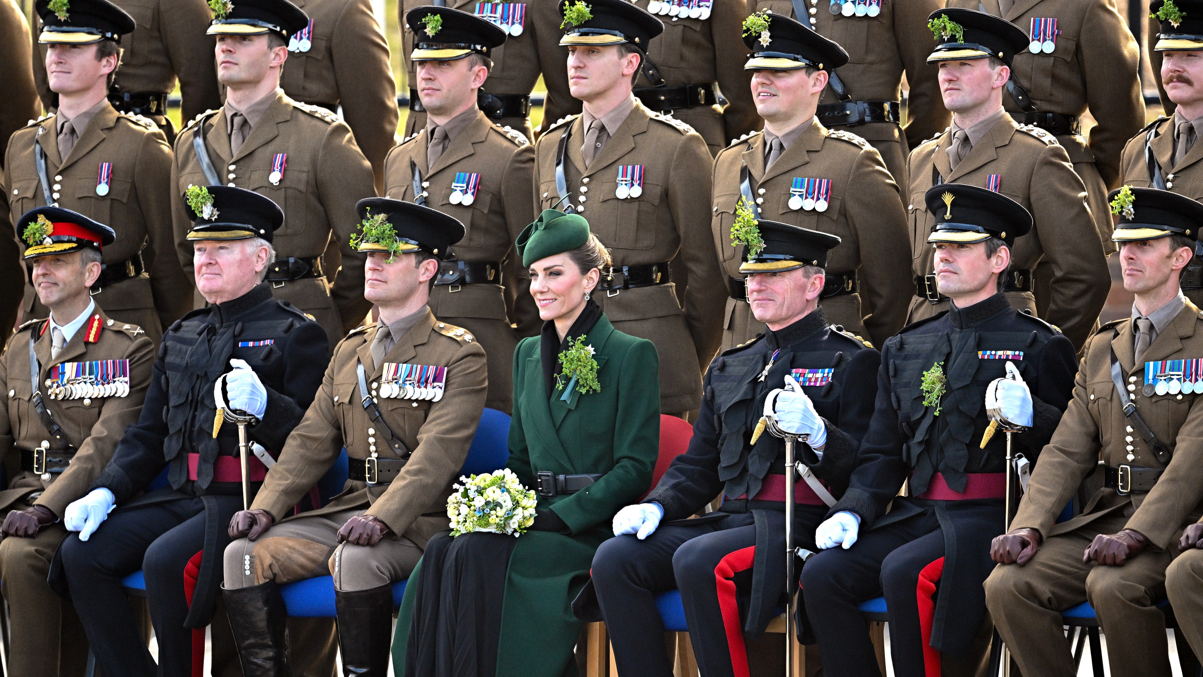 Catherine, Princess of Wales poses for a group photo during the 2026 Irish Guards' St. Patrick's Day Parade at Mons Barracks on March 17, 2026