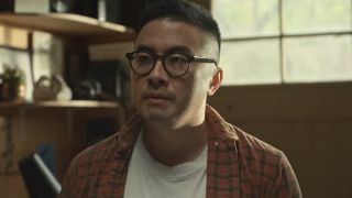 Bowen Yang looking concerned in the trailer for The Wedding Banquet