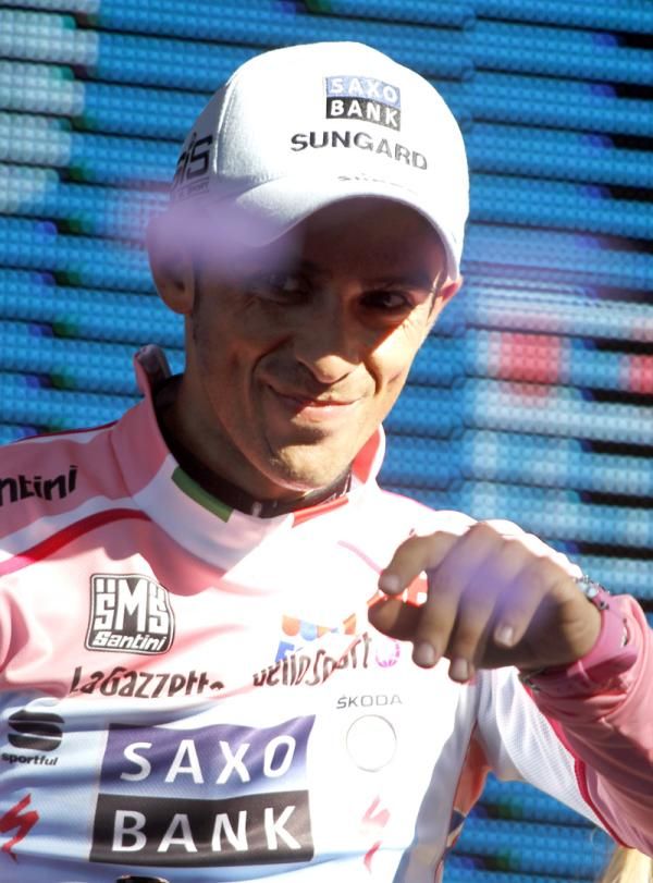 Pretty in pink: Contador smiles for the crowd