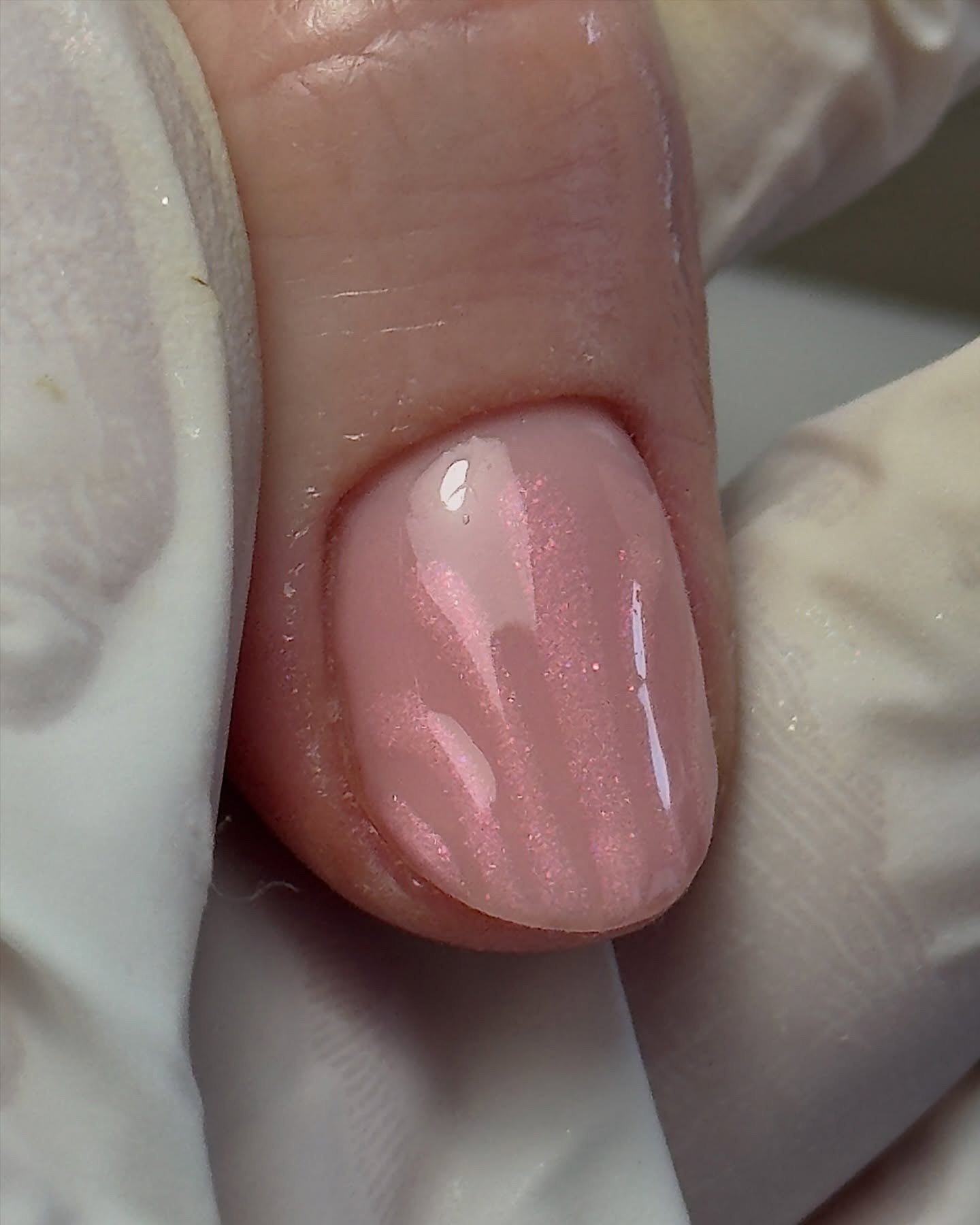 Image of a nail with chrome designs.