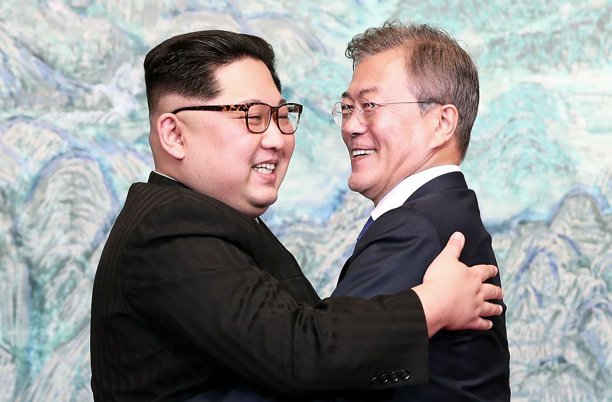 Kim Jong Un and Moon Jae-in embrace after signing the Panmunjom Declaration for Peace