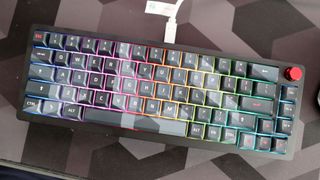 A Das Keyboard DeltaForce 65 gaming keyboard with Cherry MX switches and in camo colourway on a desk.