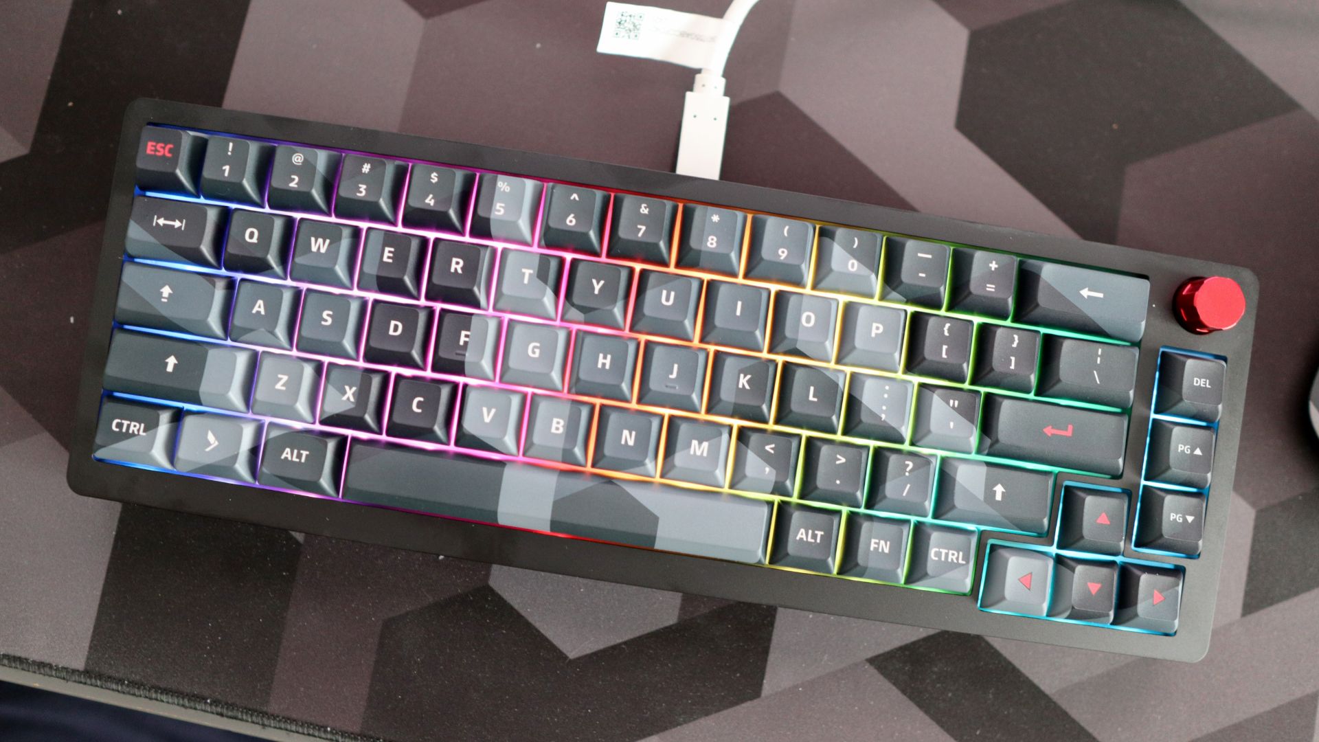 A Das Keyboard DeltaForce 65 gaming keyboard with Cherry MX switches and in camo colourway on a desk.
