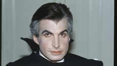 An actor poses as Dracula 