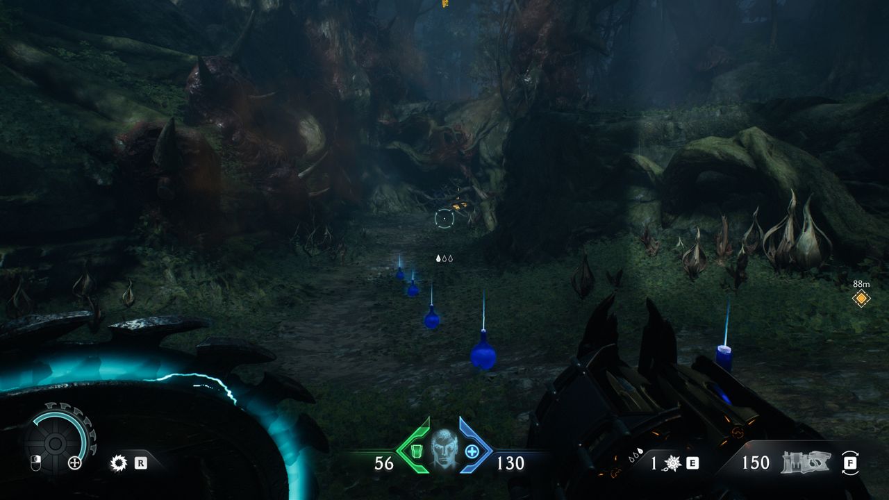 Doom: The Dark Ages Abyssal Forest secrets - A gold chest hidden behind a barricade made of roots.