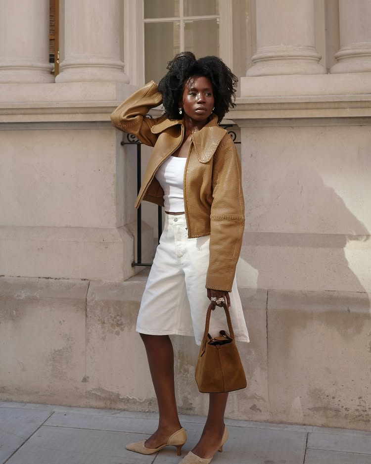 @daniellejinadu wears white denim Bermuda shorts with pointed-toe heels
