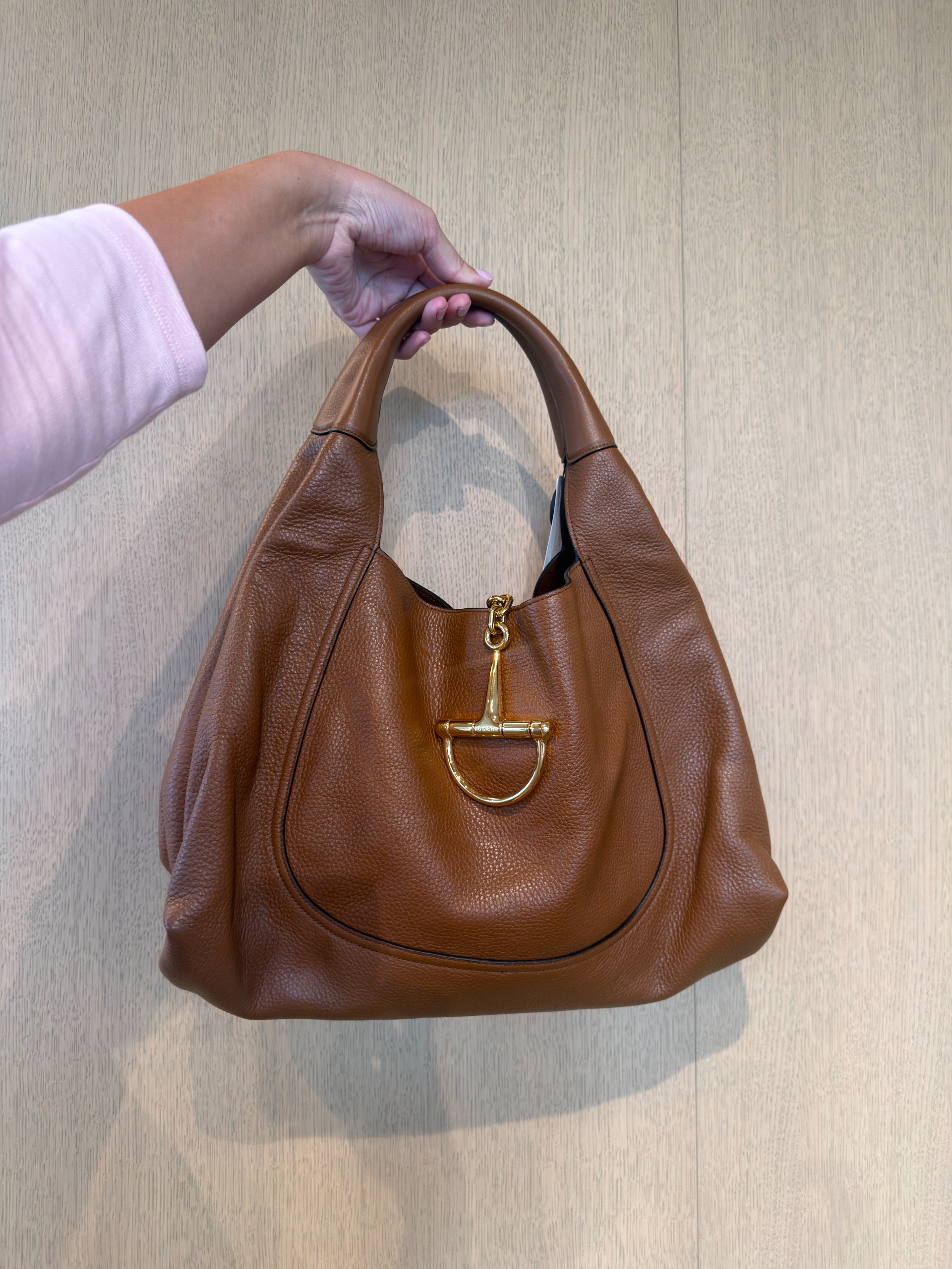 Who What Wear editor Ana Escalante holding a Gucci Softbit Maxi Shoulder Bag