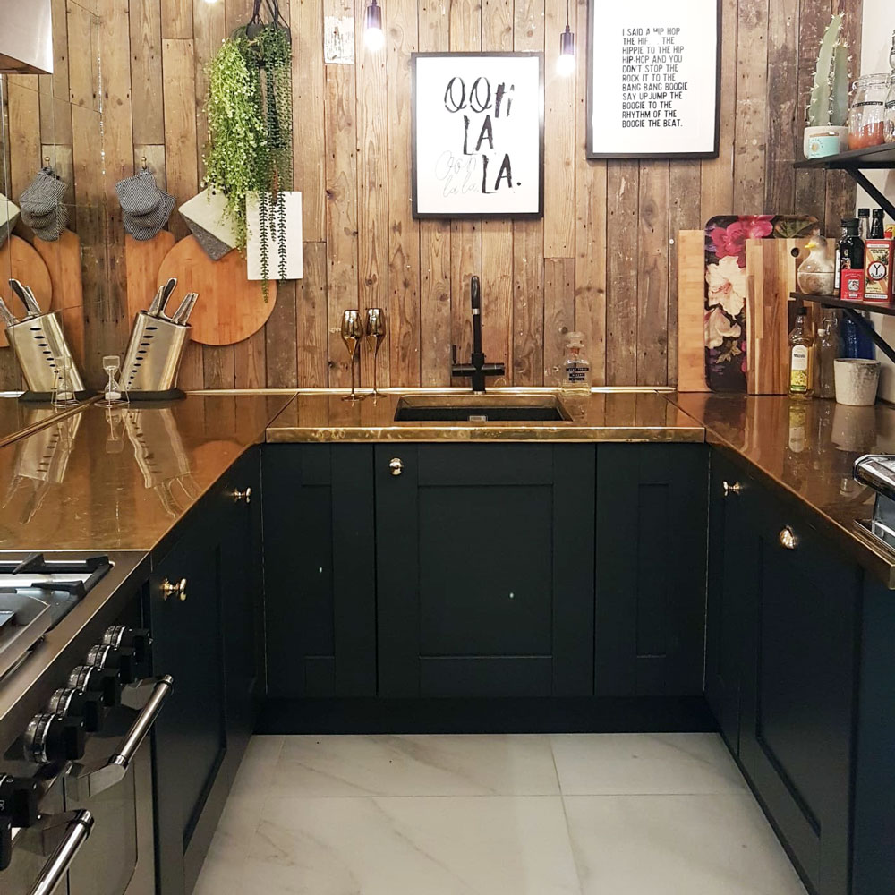 kitchen with wooden wall green foliage