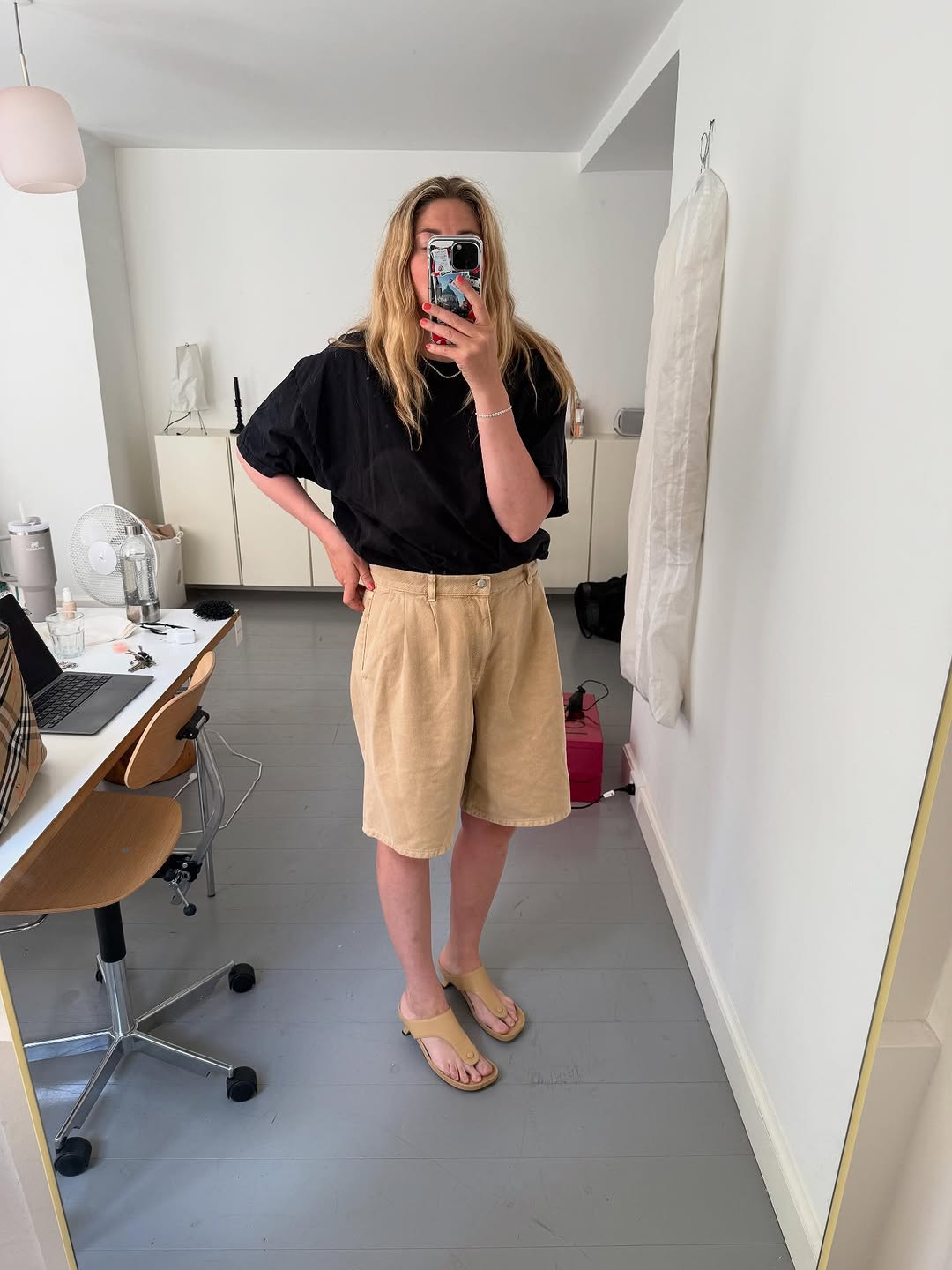 Woman wearing khaki denim trend 2025.