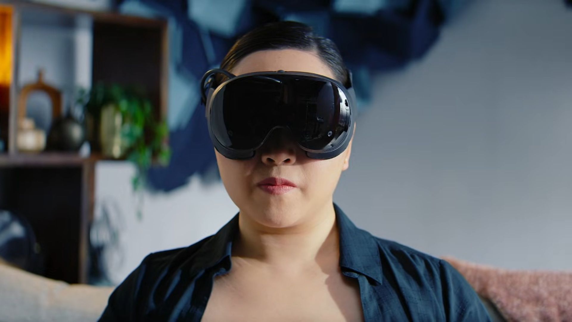 A woman wearing the Steam Frame headset