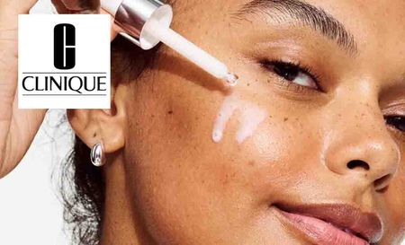 clinique logo top left with a close up shot of a woman pouring product on her face 