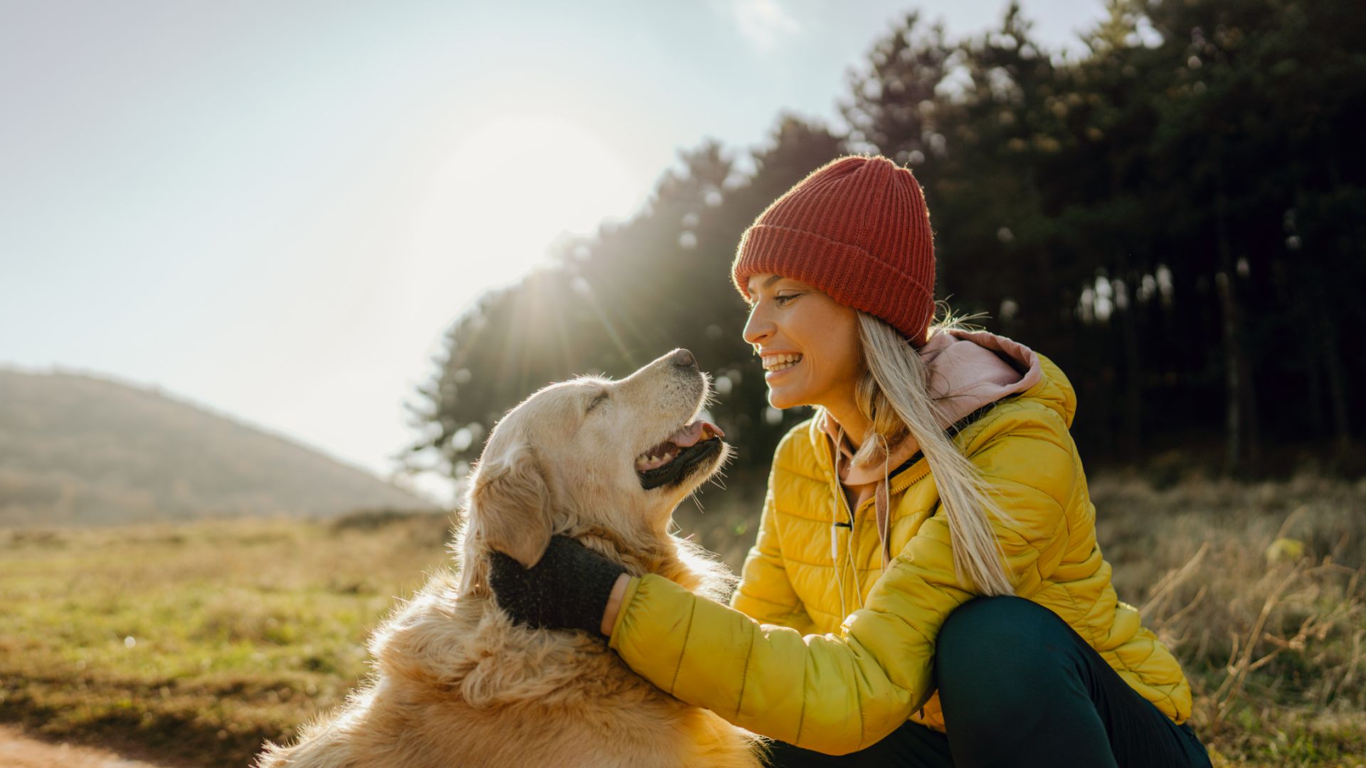 Woman sitting outside with dog