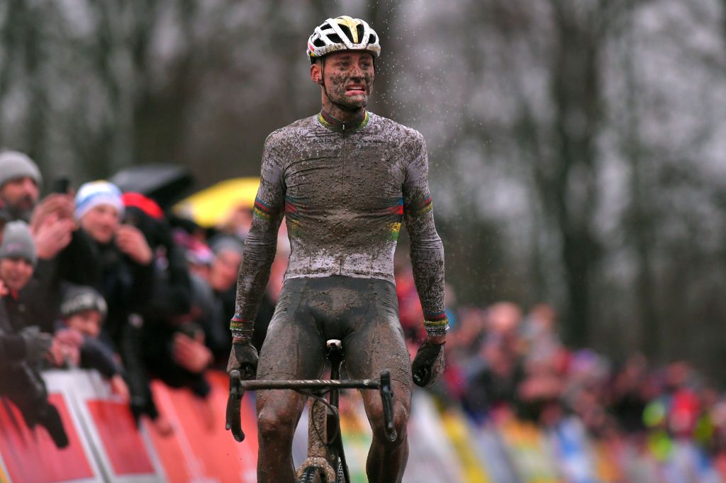 NAMUR BELGIUM DECEMBER 22 Arrival Mathieu Van Der Poel of The Netherlands and Team Corendon Circus Celebration Mud during the 11th Namur World Cup 2019 UCICX TelenetUCICXWC on December 22 2019 in Namur Belgium Photo by Luc ClaessenGetty Images
