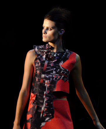 Red and black stylish dress wore by model.