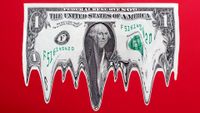 US $1 dollar bill in mid-air melting, red gradated background.