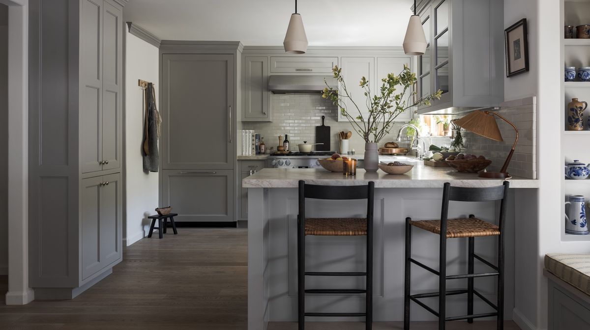 This chic kitchen renovation features warm textures and cool tones ...