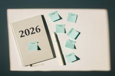 notebook with "2026" on it and a pen and little sticky notes that say "ASAP" 